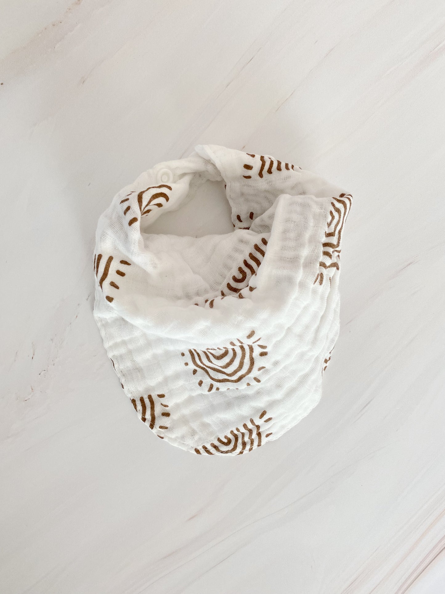 Babero de muselina estampado