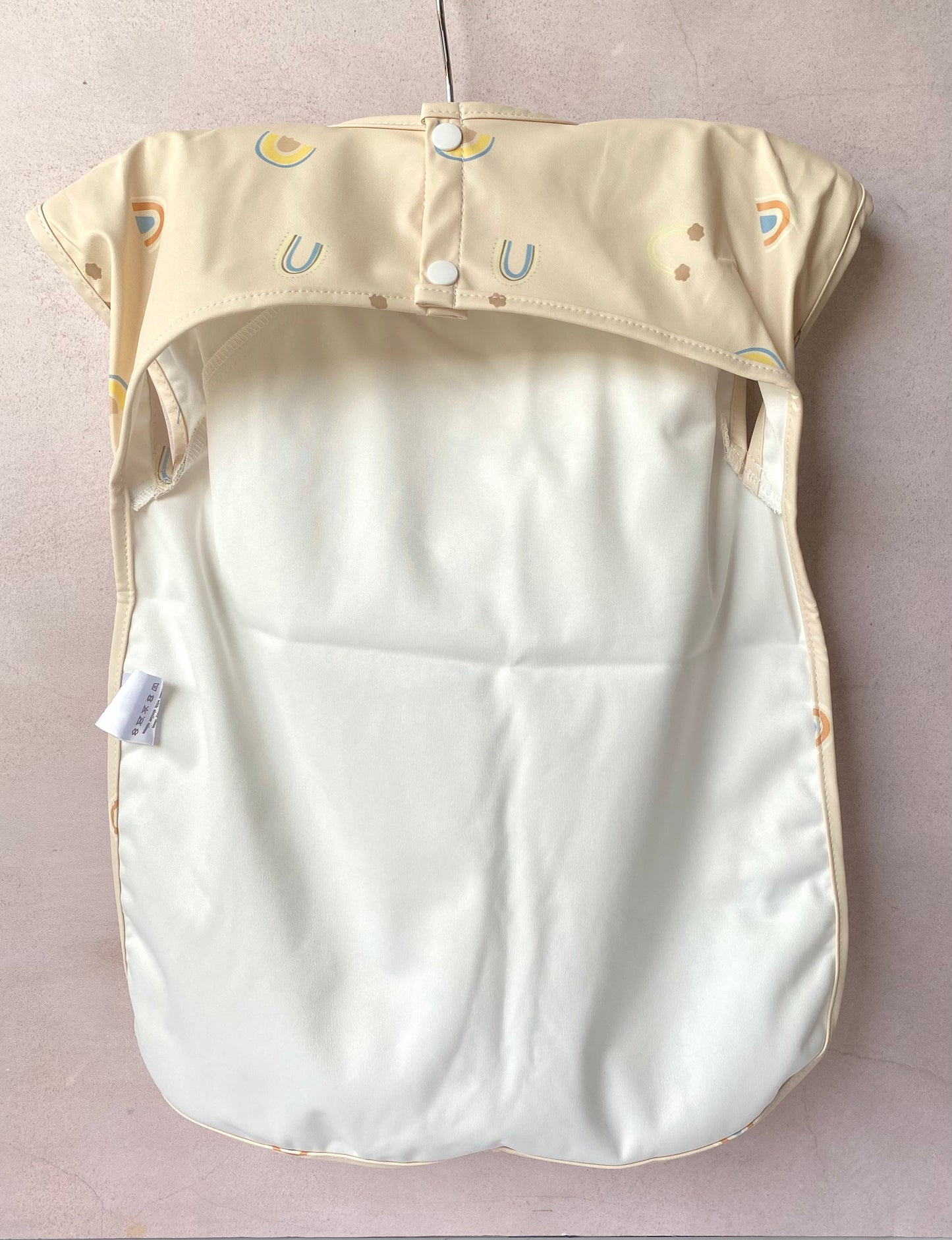 Babero impermeable Arcoíris