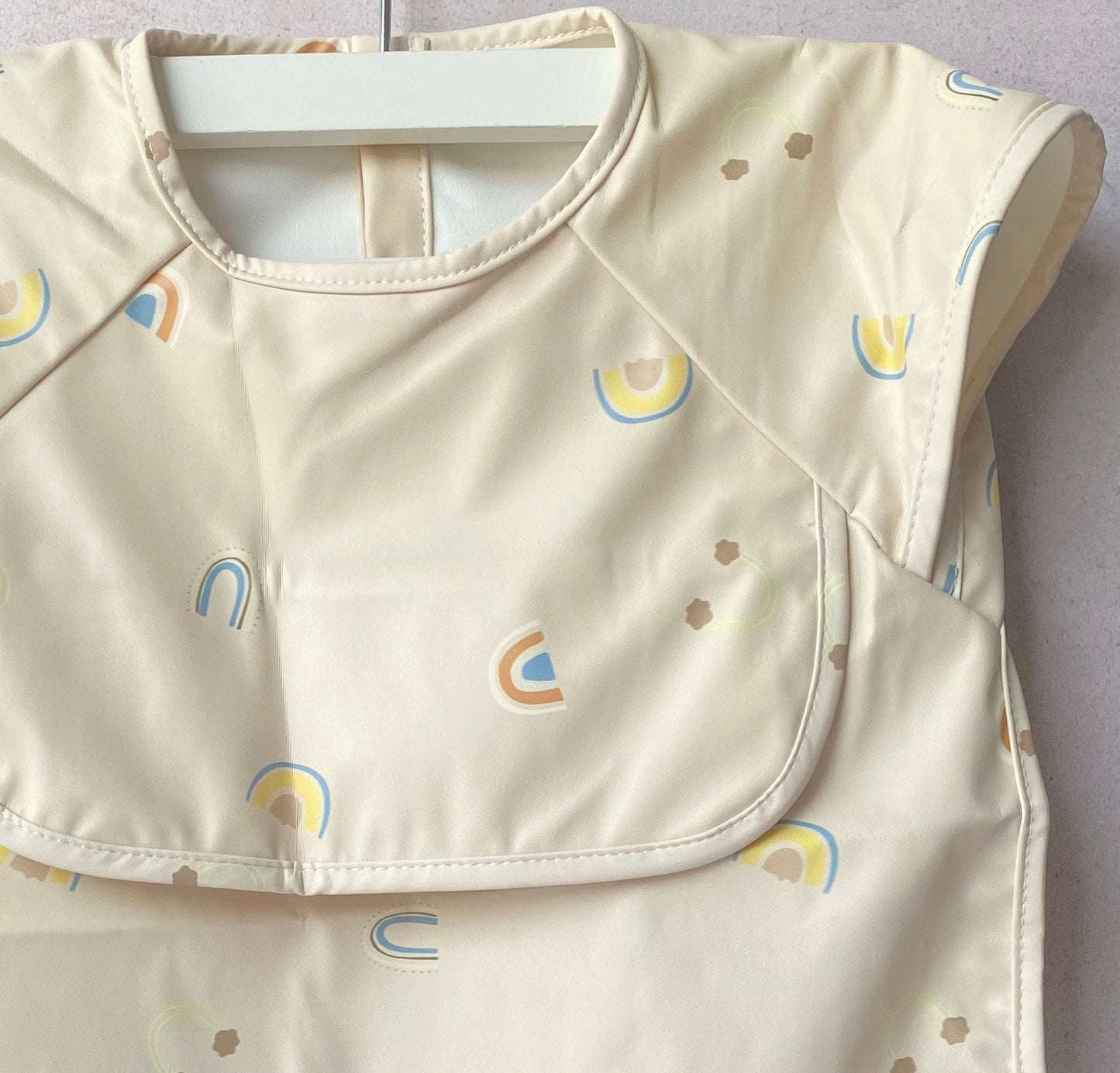 Babero impermeable Arcoíris