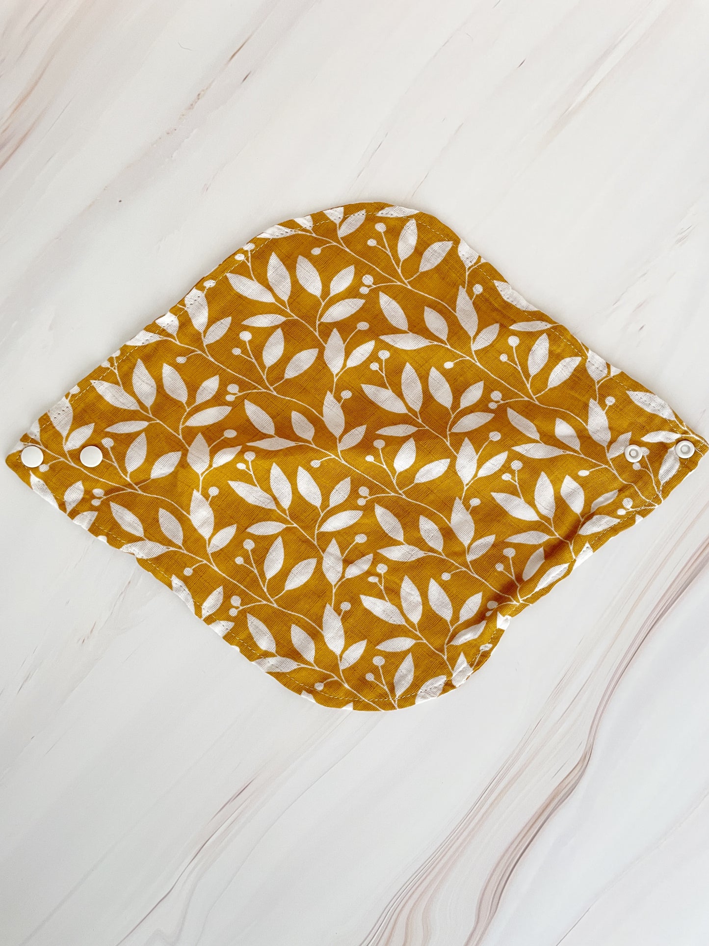 Babero de muselina estampado