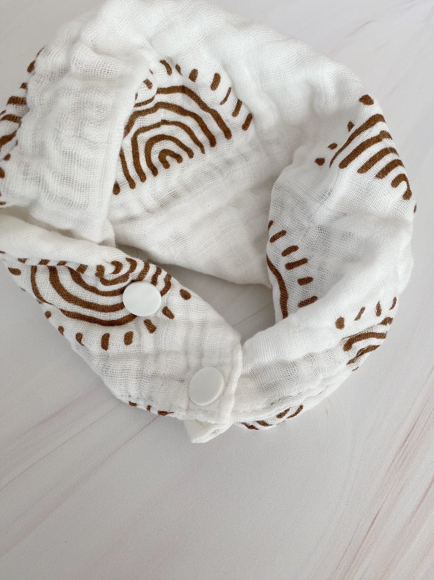 Babero de muselina estampado