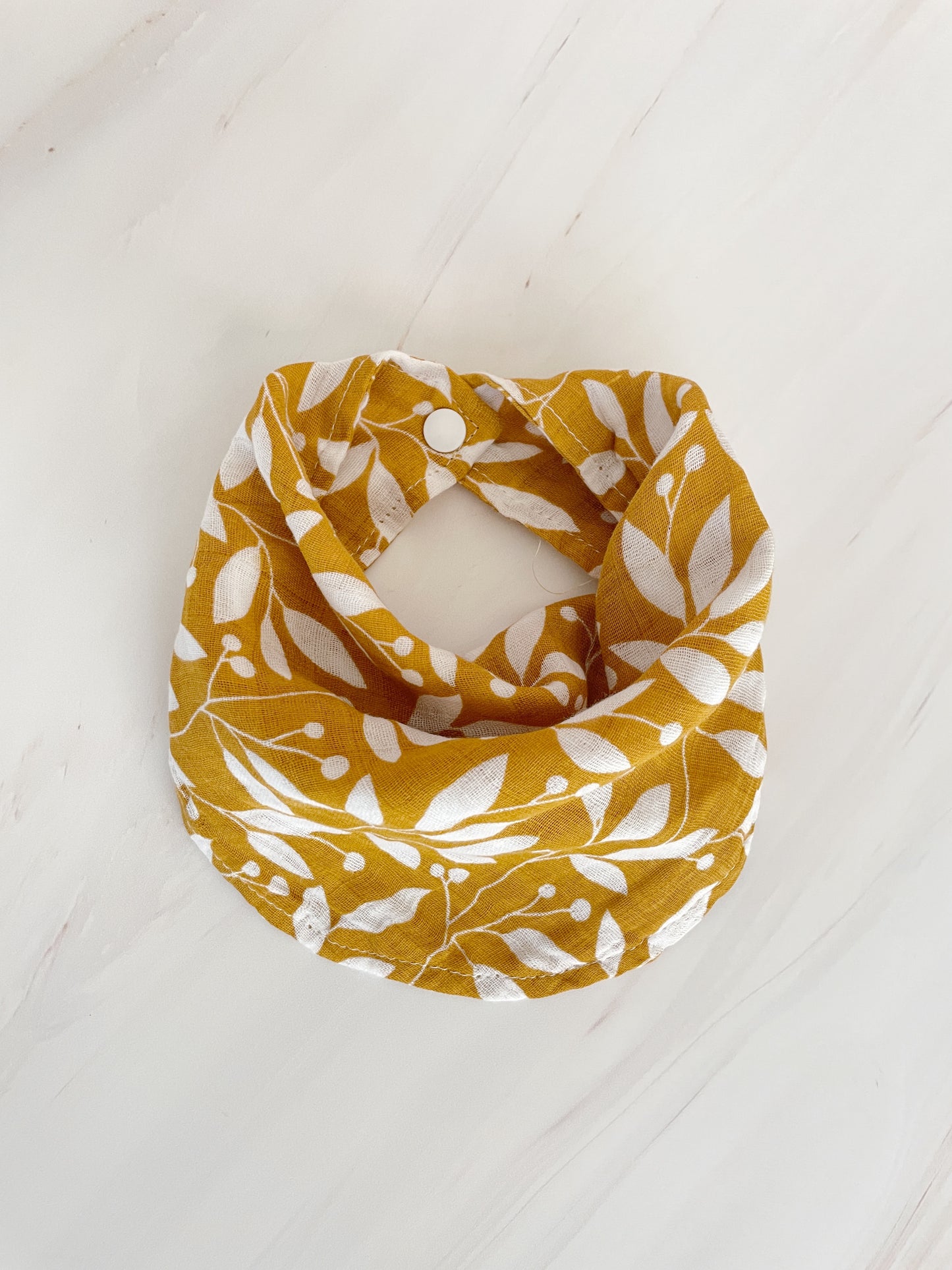 Babero de muselina estampado