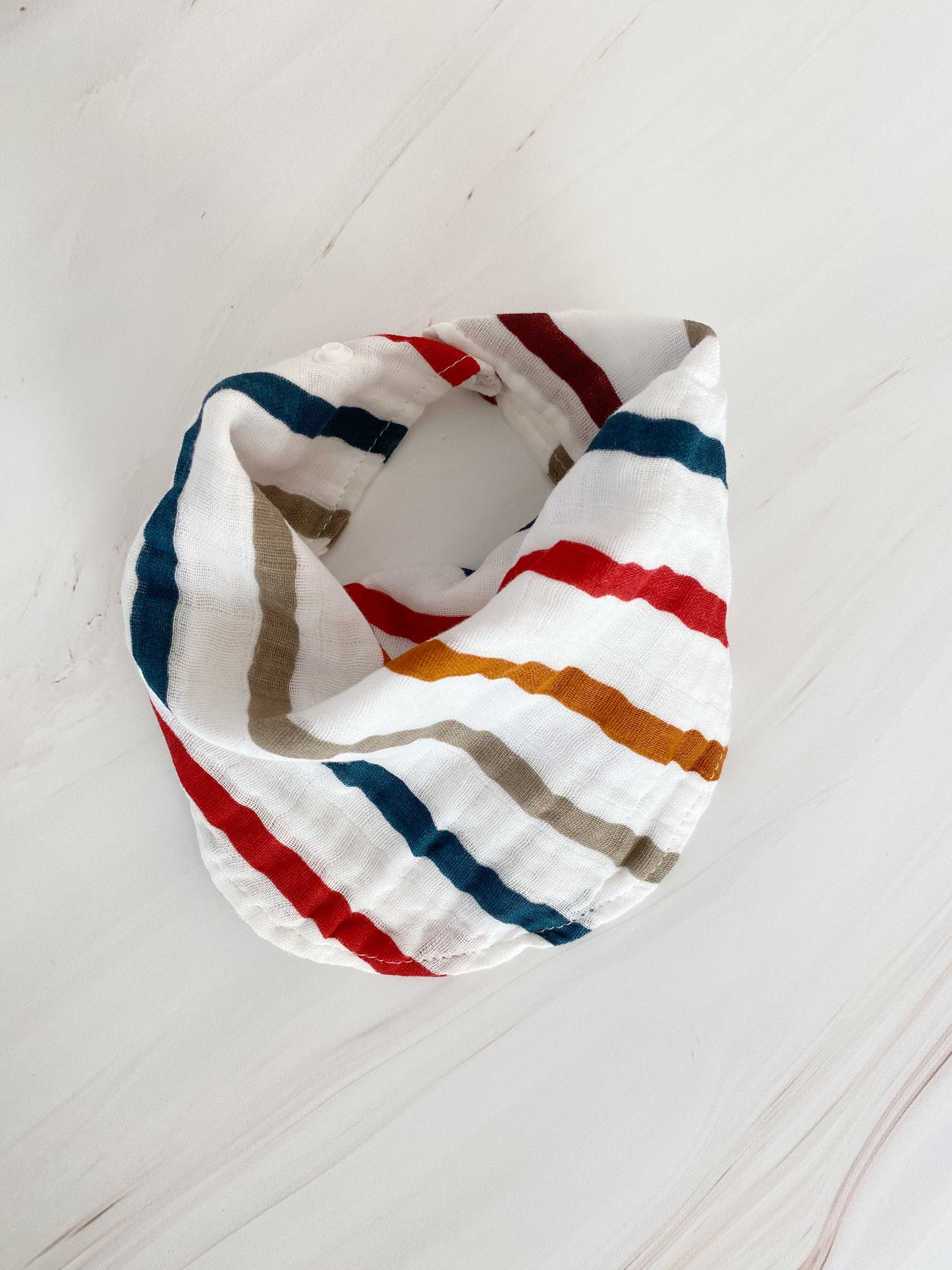 Babero de muselina estampado