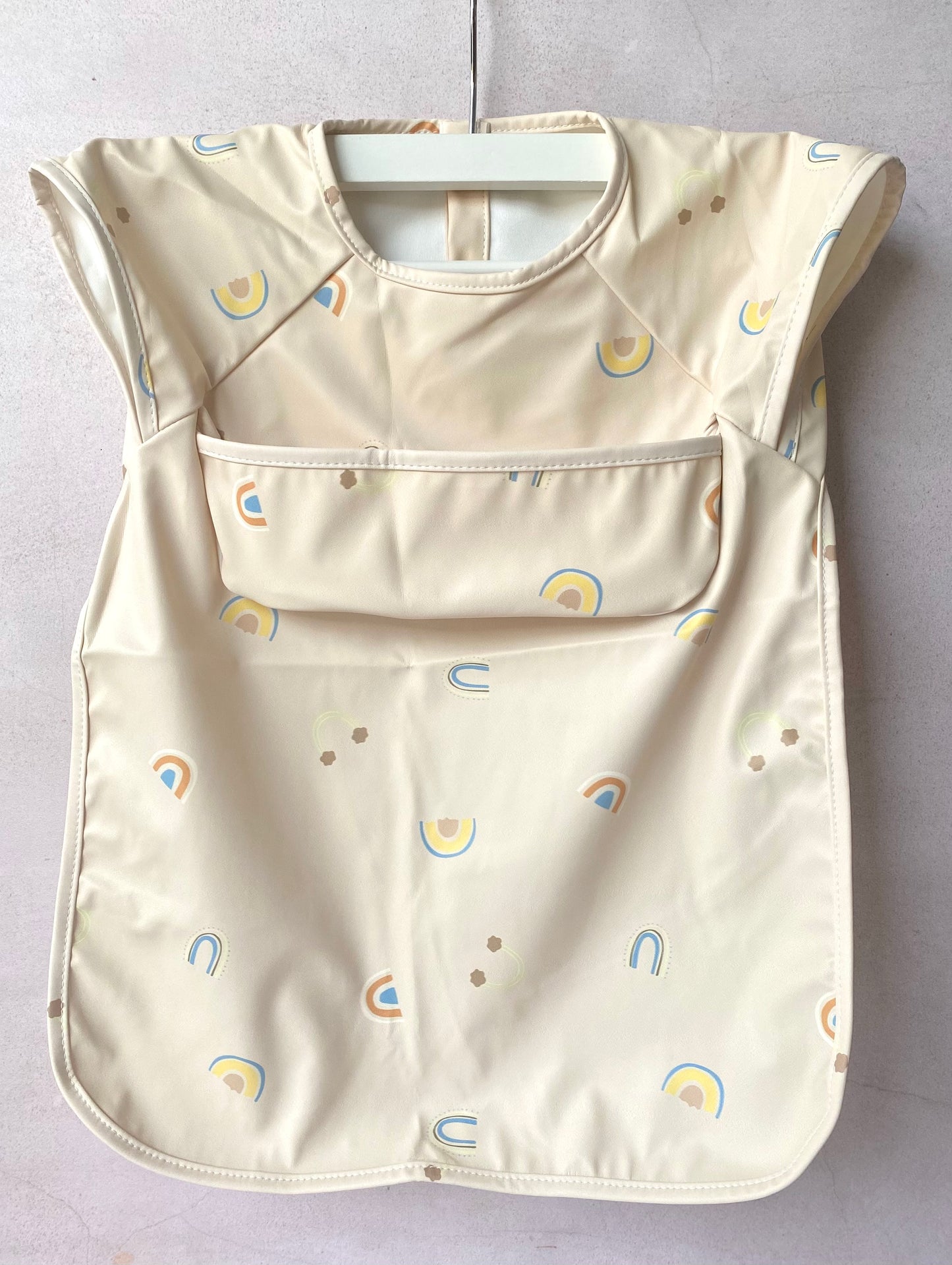 Babero impermeable Arcoíris