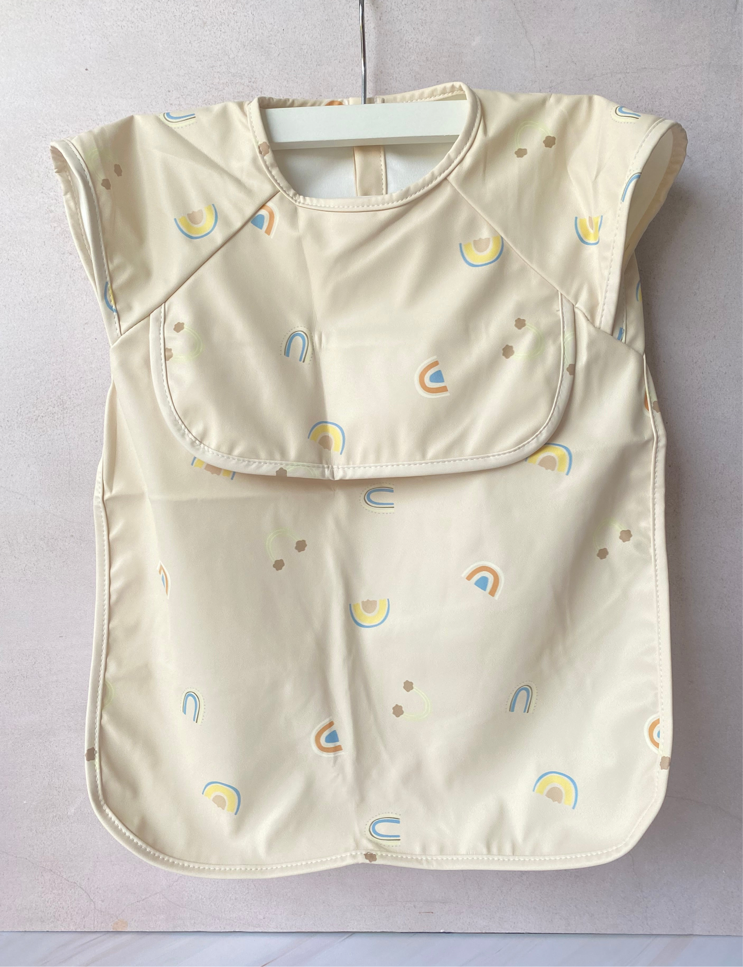 Babero impermeable Arcoíris