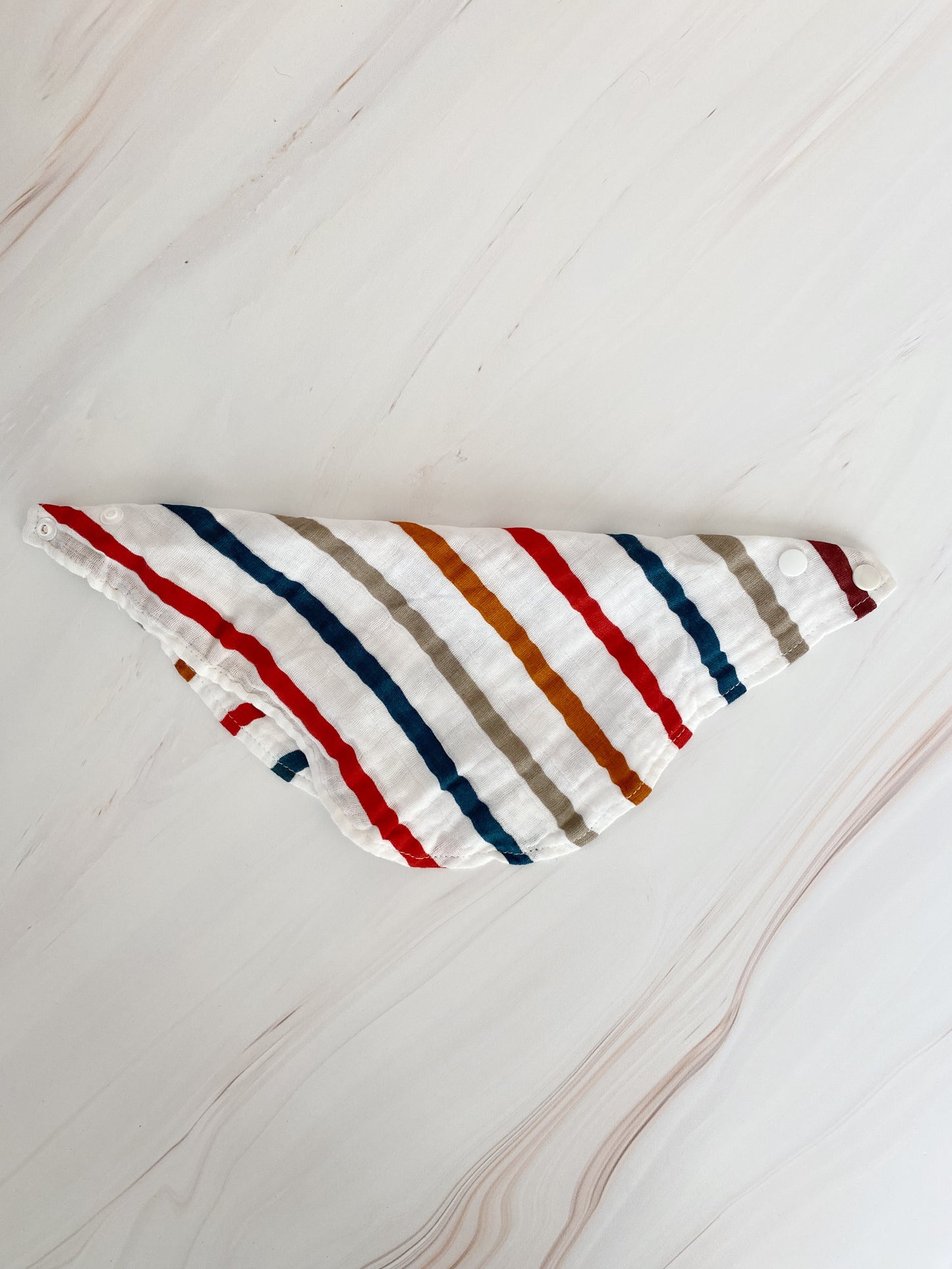 Babero de muselina estampado