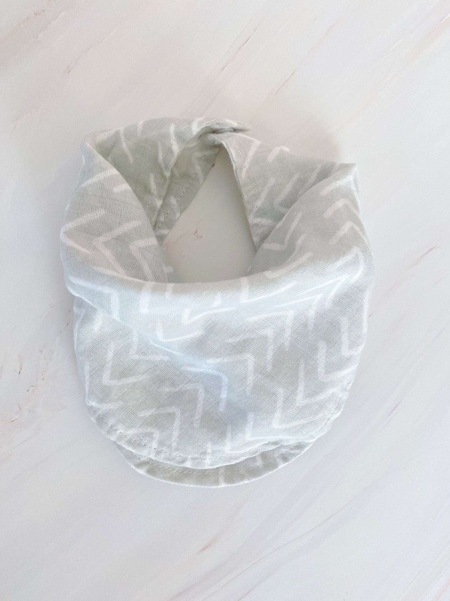 Babero de muselina estampado